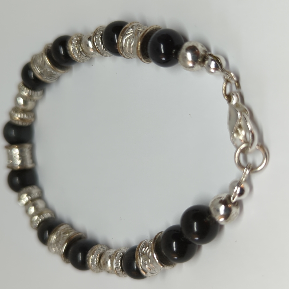 Black and silver toned beaded bracelet